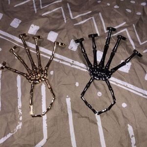Gold and Black Skeleton Hand accessory